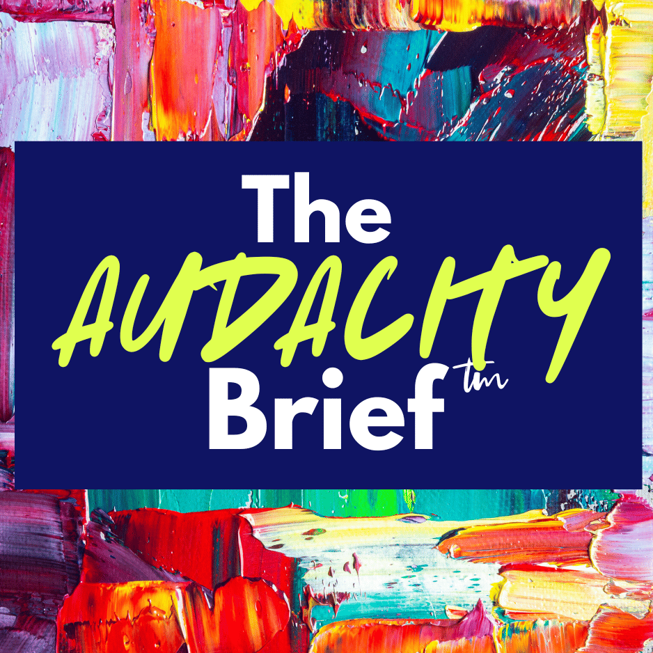 The Audacity Brief as word stacked on top of each on a navy blue box.  There is a bold, colorful pattern in the background.