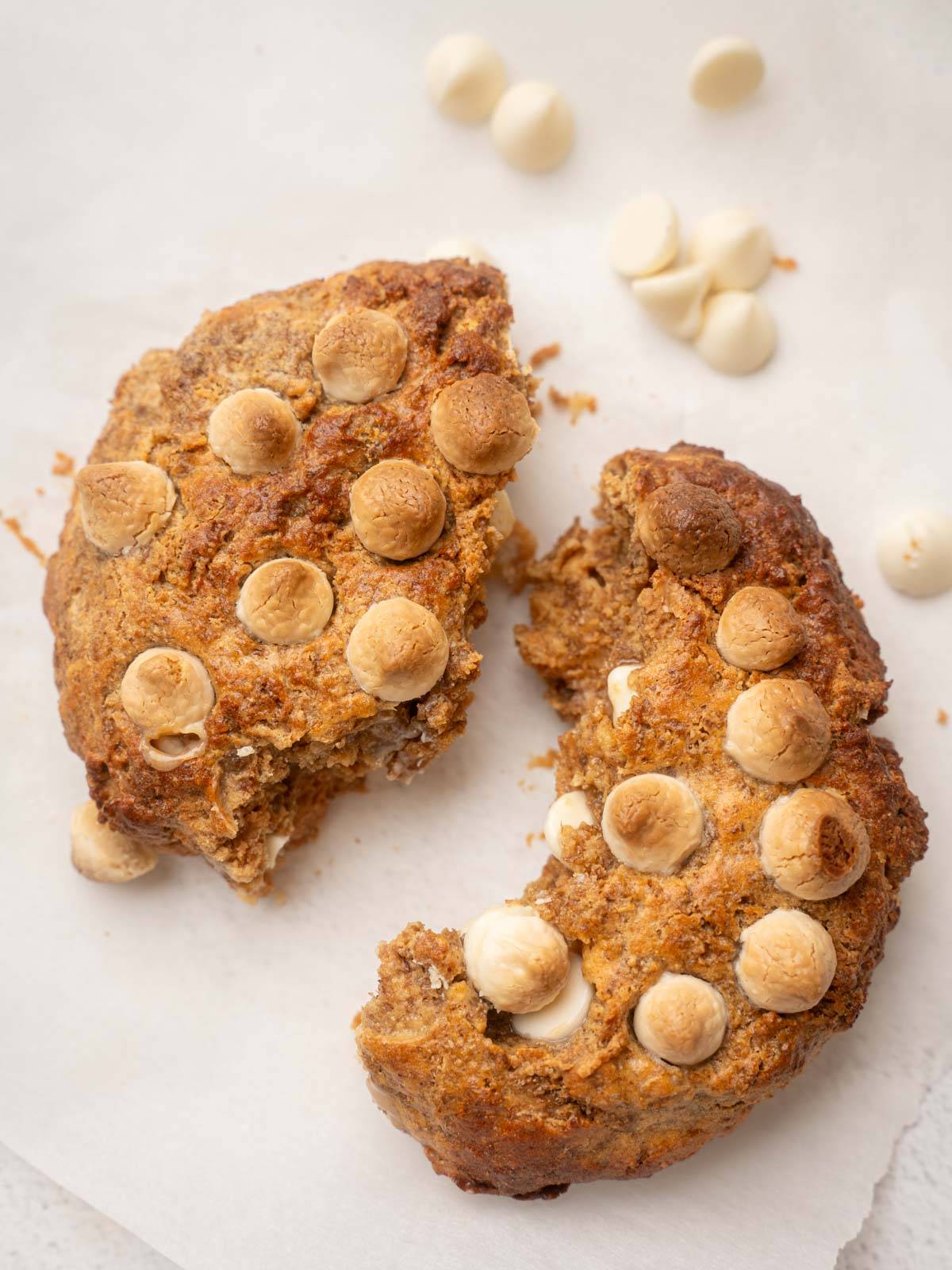 weetabix cake with chocolate chips cracked in half on a white table