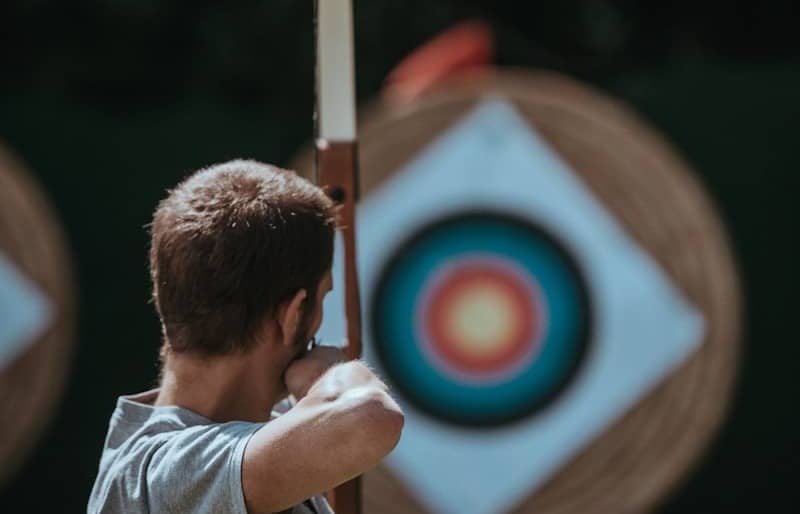 white and brown composite bow