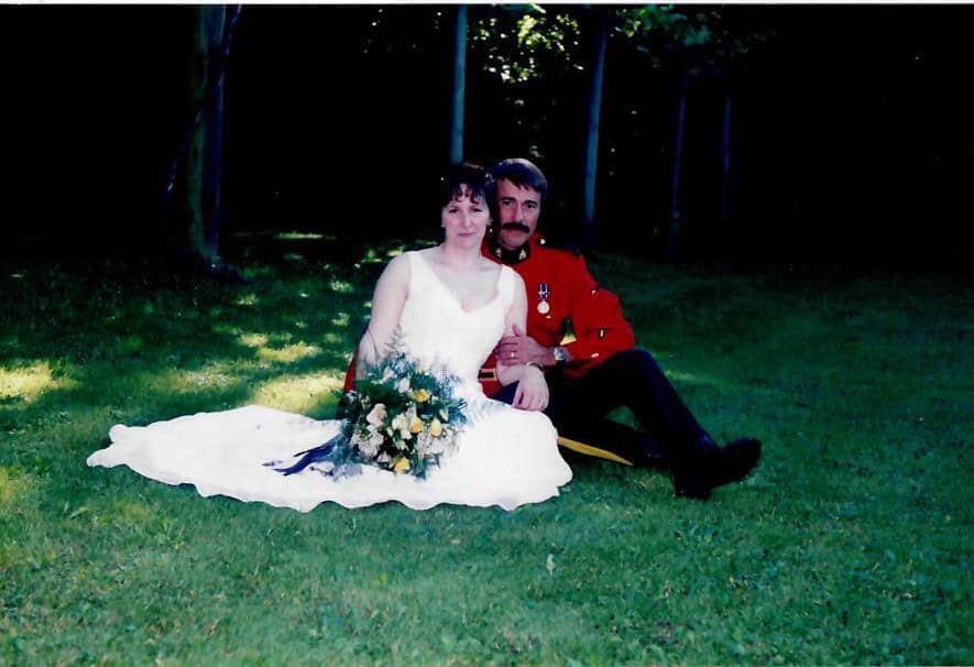 wedding photo of couple on a lawn
