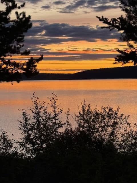 Orange sunrise over a lake