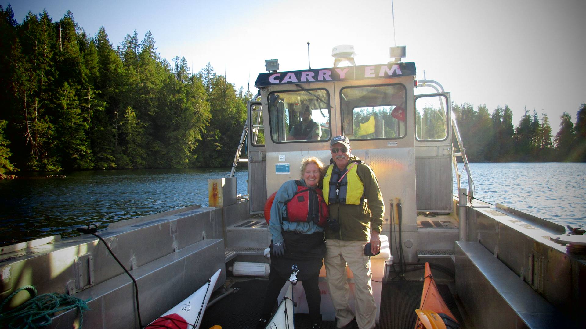man and woman on a tugboat