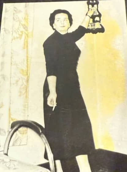 woman standing in dress 1955