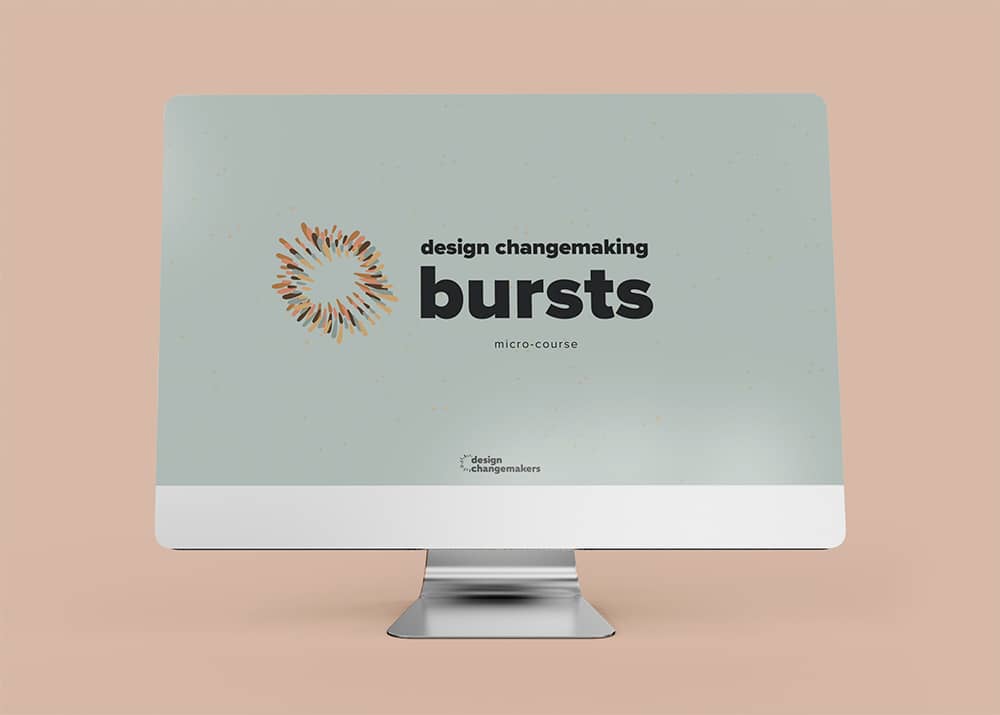 A desktop monitor showing a landing page that says "design changemaking bursts micro-course" next to a colorful starbursts. The Design Changemakers logo is at the bottom of the screen.