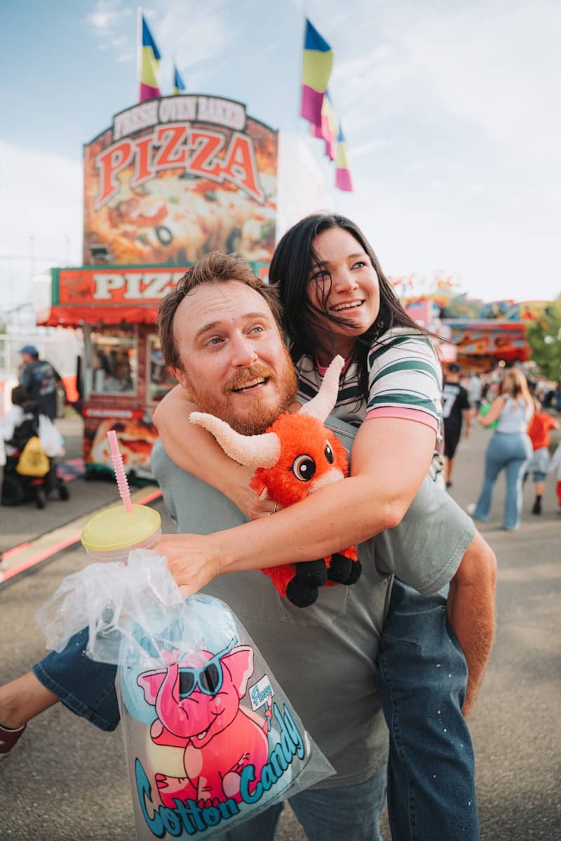 Couple enjoying a day at the carnival