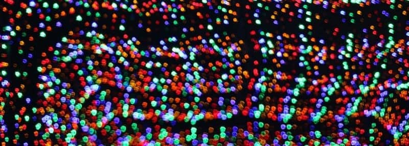 Abstract background of colorful blurred lights at night.