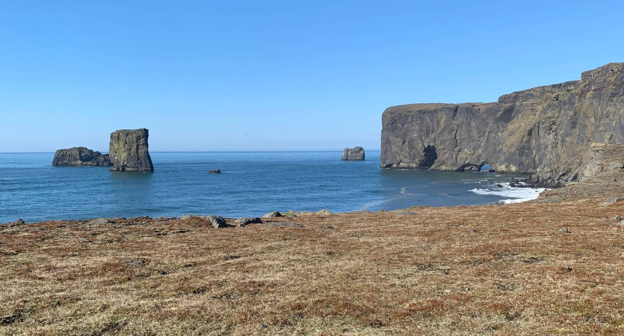 Dramatic rocky cliffs over the ocean
