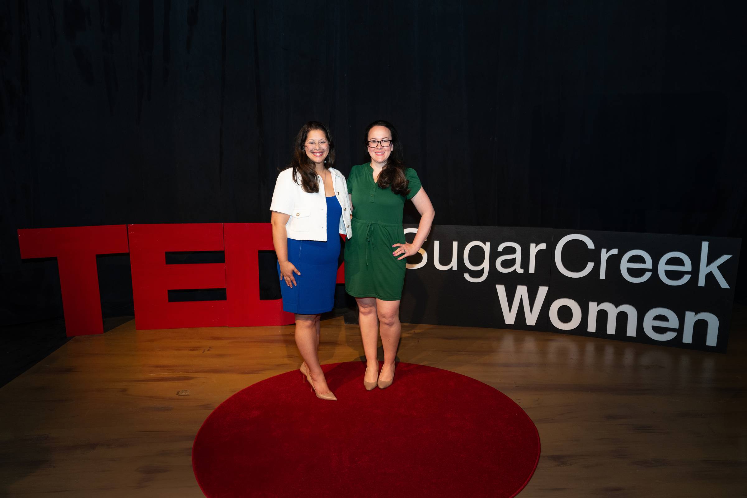 Nia and Tara on the TEDx stage