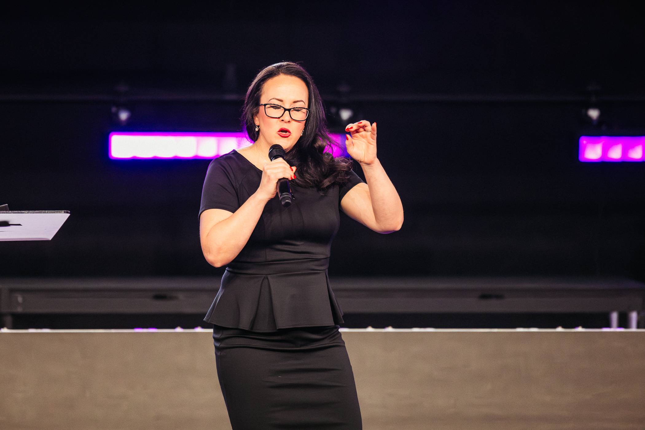 Tara speaking on stage