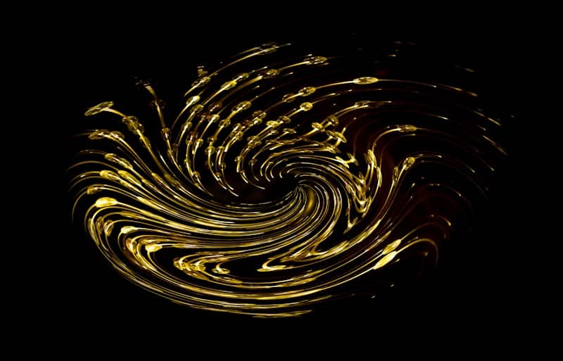 Golden swirl pattern on black background