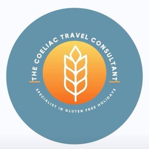 Logo of the Coeliac Travel Consultant, a pastel blue circle with an orange middle and a wheat stalk icon.