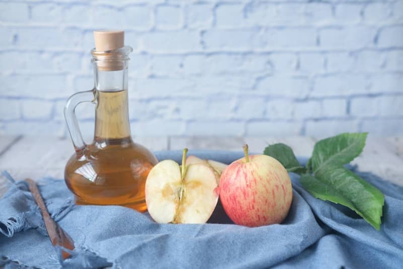 What is vinegar and how does it preserve food?