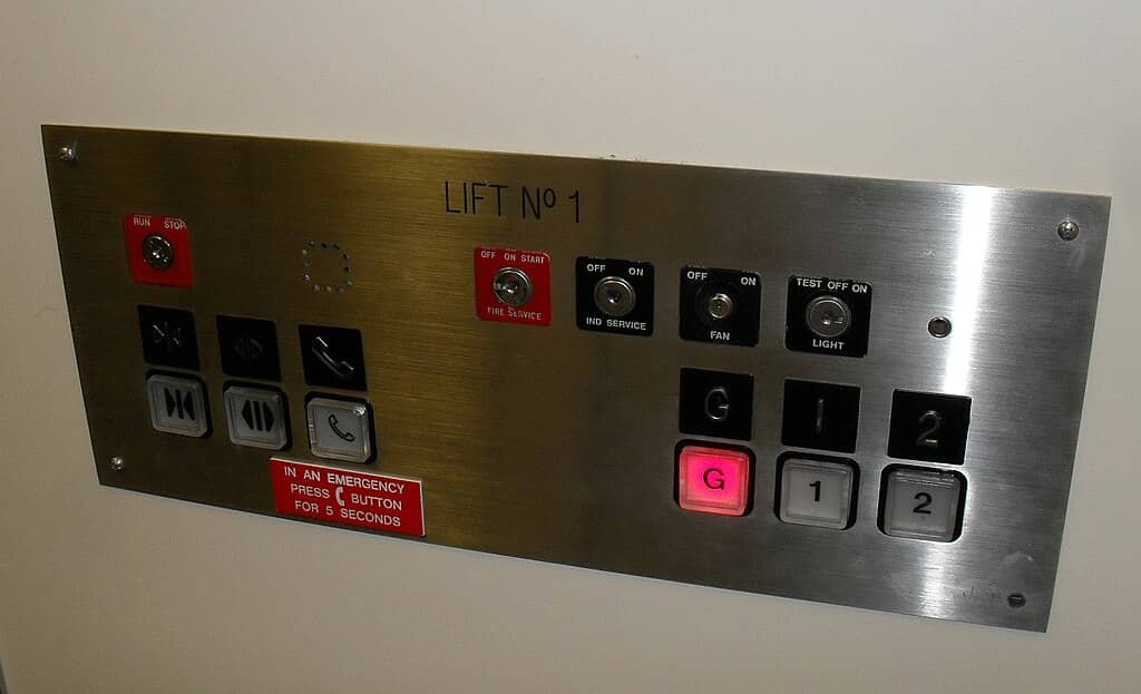 Image showing an elevator control panel with a key hole to turn on Fire Service Mode.