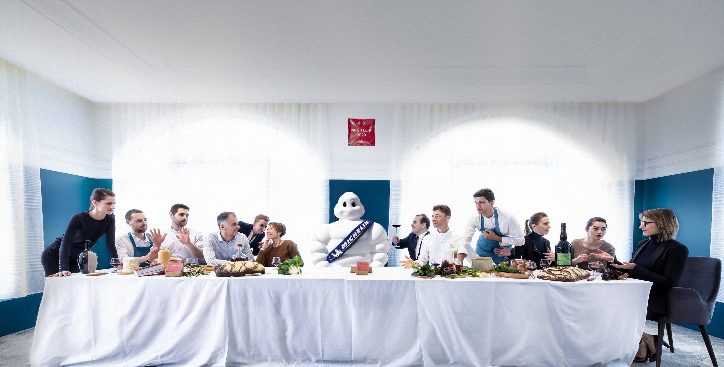 A parody image staging chefs around the Michelin man like in the Last Supper painting