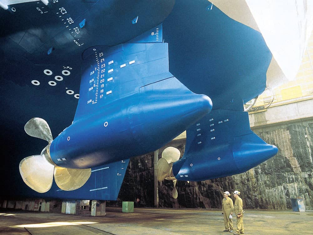 Azimuth thrusters or Azipods positioned "backwards" on a ship with people for reference. 