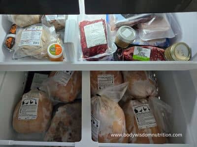 Freezer with chickens, beef roast, steak, and roe