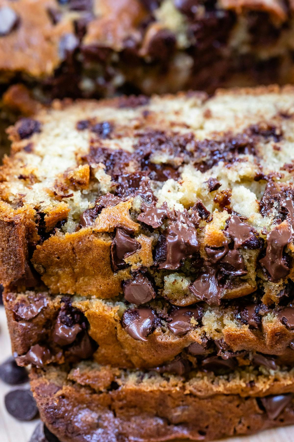 sliced banana bread with melted chocolate chips throughout the whole recipe.