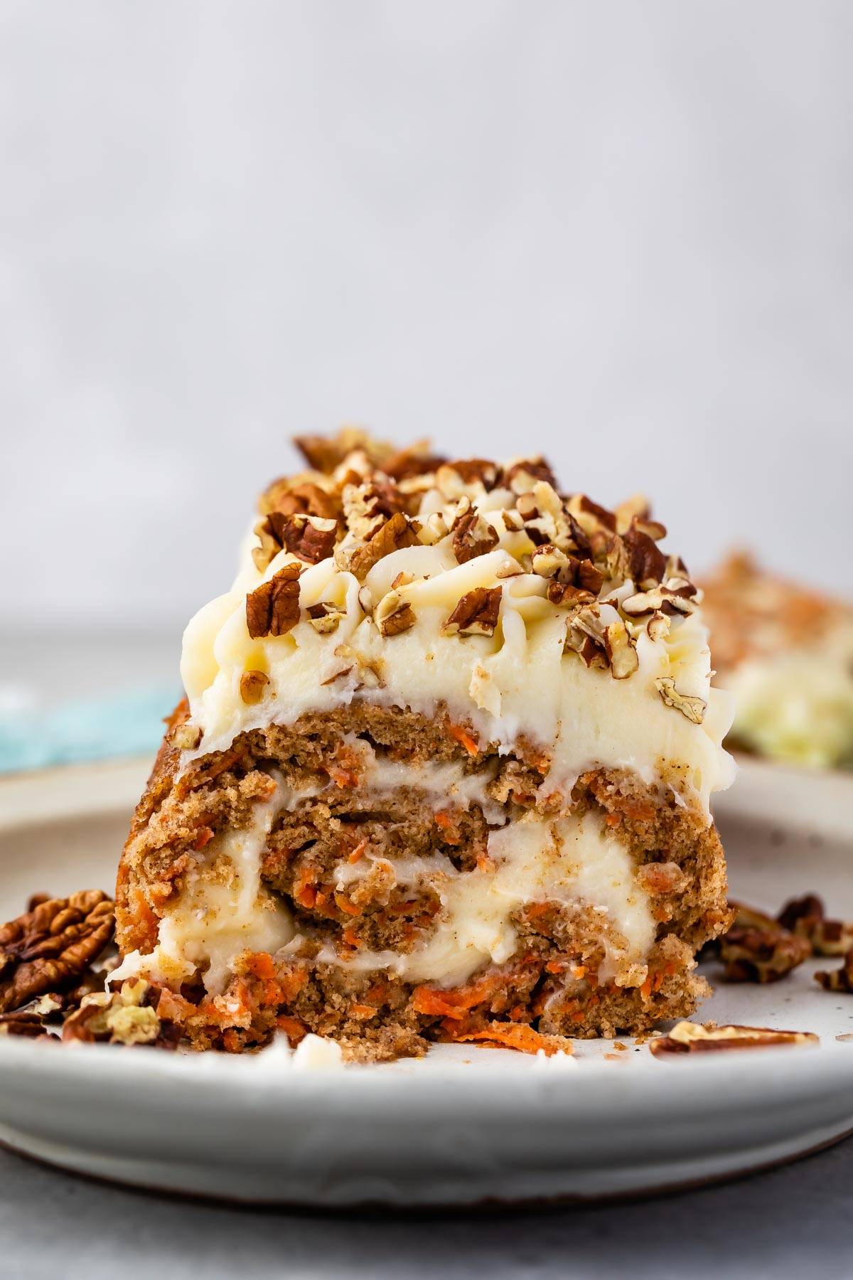 carrot cake roll head on image with frosting