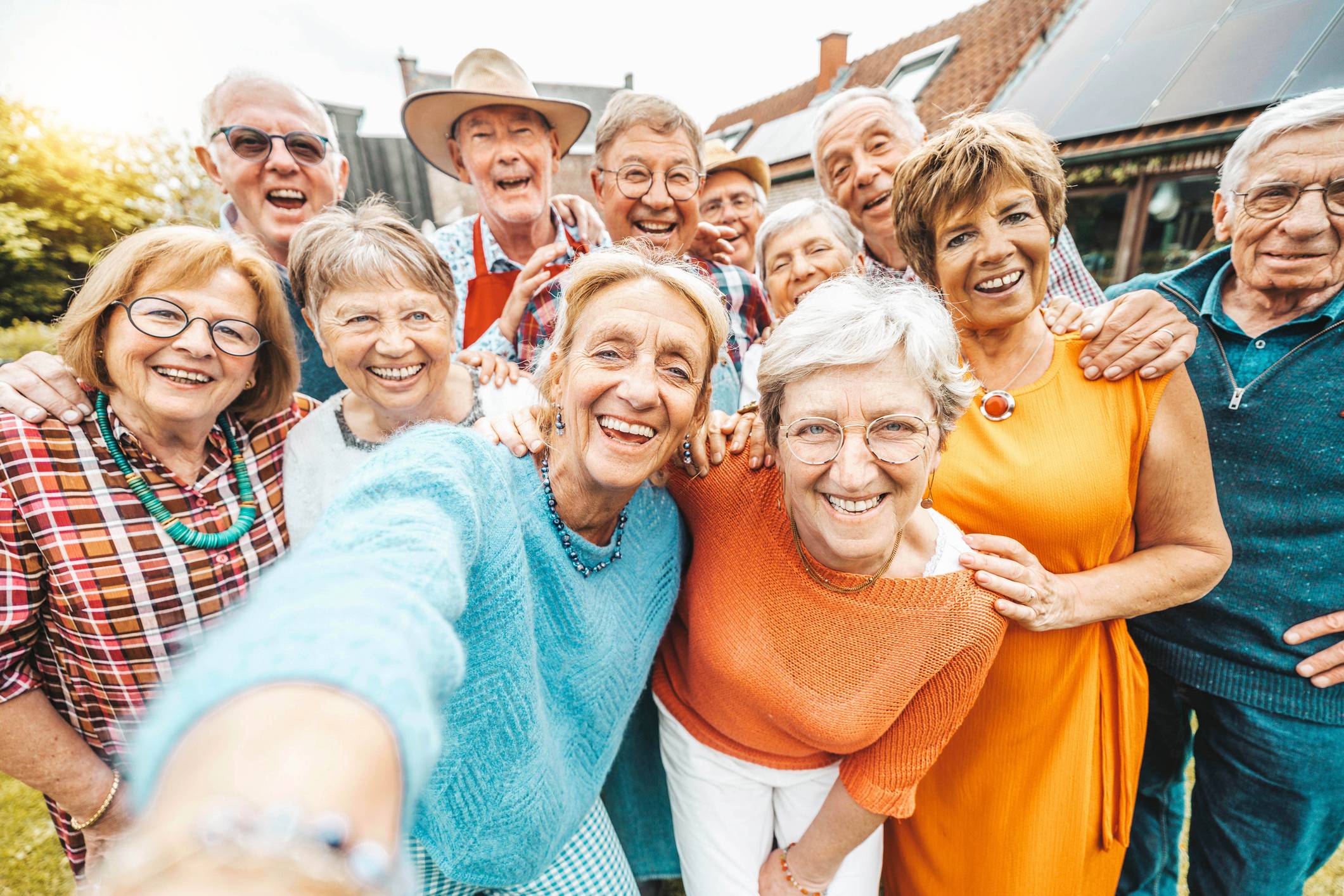 Older adults smiling in a selfie