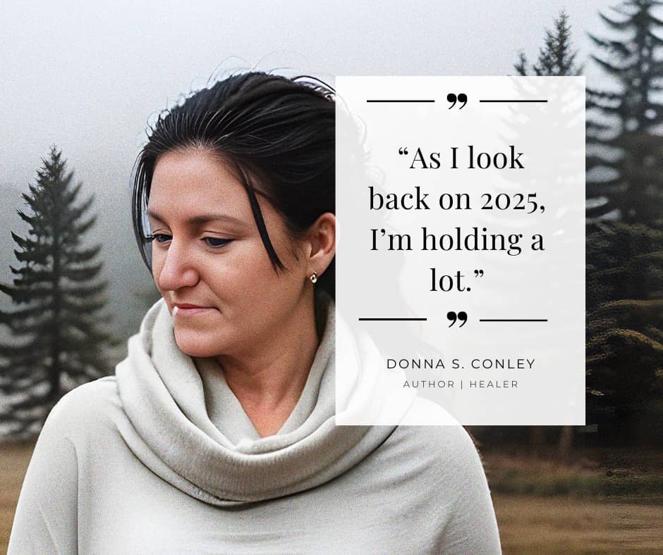 Portrait of Donna S. Conley outdoors in a misty forest, looking down thoughtfully. Overlaid text reads: “As I look back on 2025, I’m holding a lot.