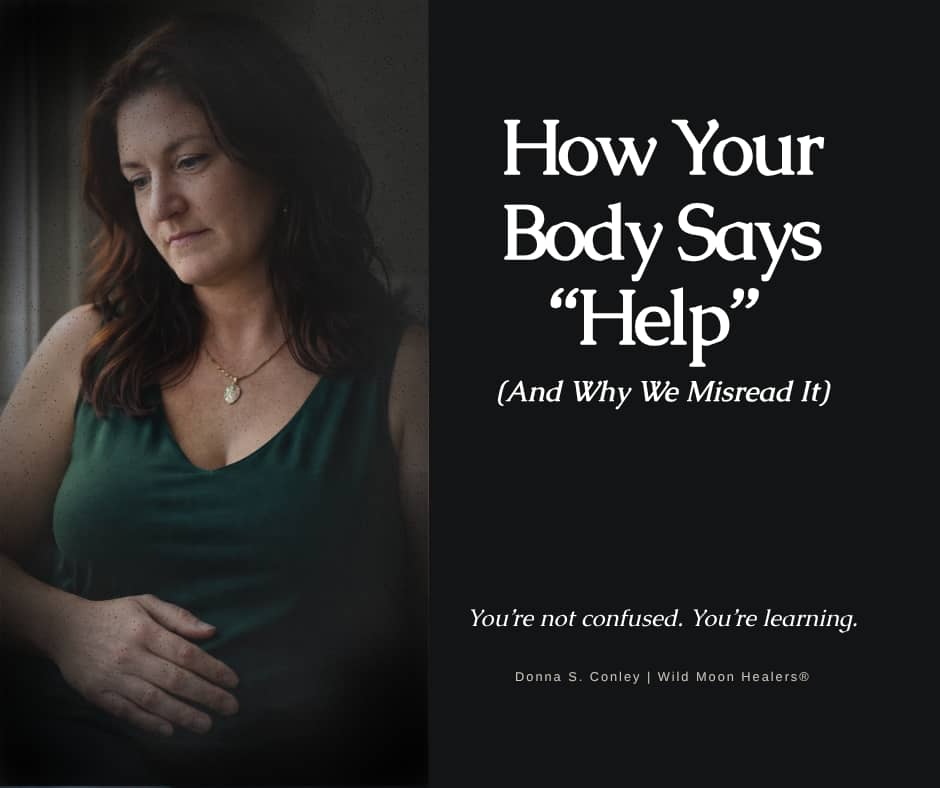 A dark, moody promotional graphic for a blog titled “How Your Body Says ‘Help’ (And Why We Misread It)” by Donna S. Conley of Wild Moon Healers®. The image features a thoughtful woman in a green tank top resting one hand on her lower stomach while looking
