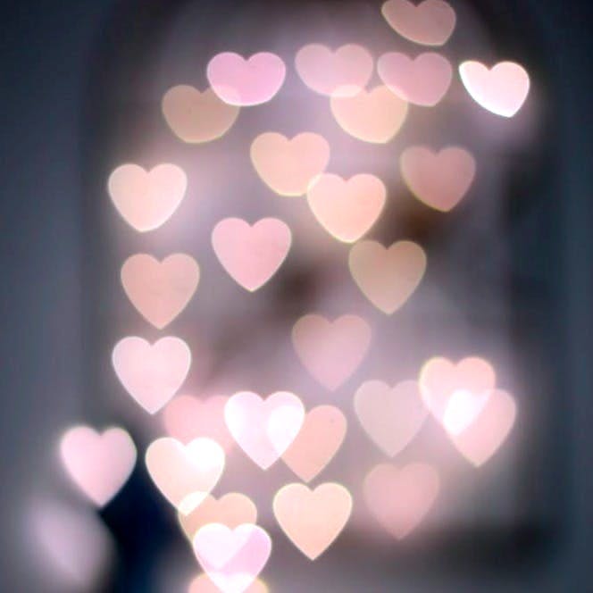 multiple blurry heart shaped lights
