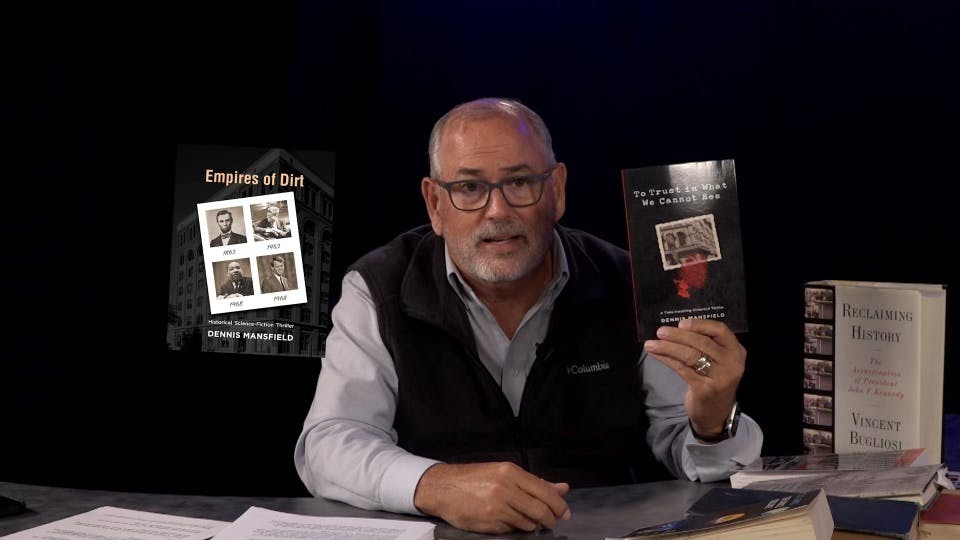 Dennis Mansfield showing his books on his podcast, Just Around the Corner