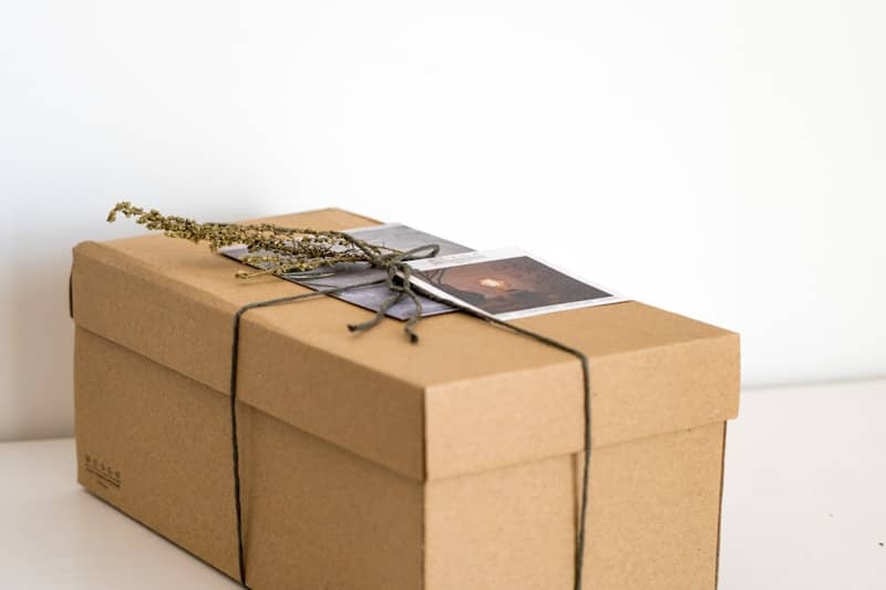 A brown box with a picture on it sitting on a table