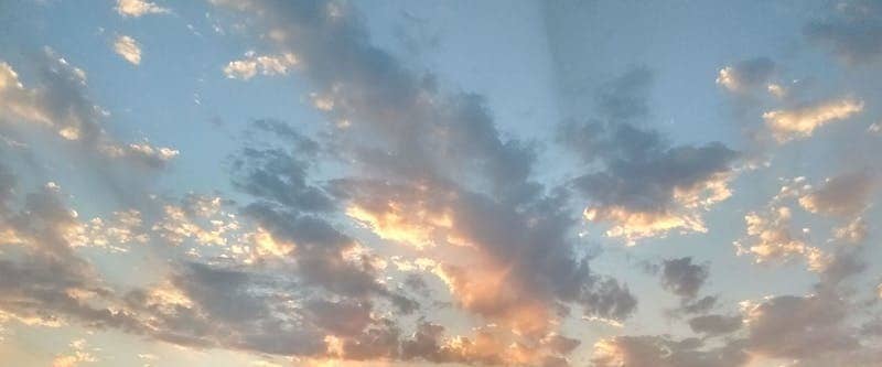A sunrise or sunset image symbolizing new beginnings and the passage of time, which ties into the theme of personal evolution