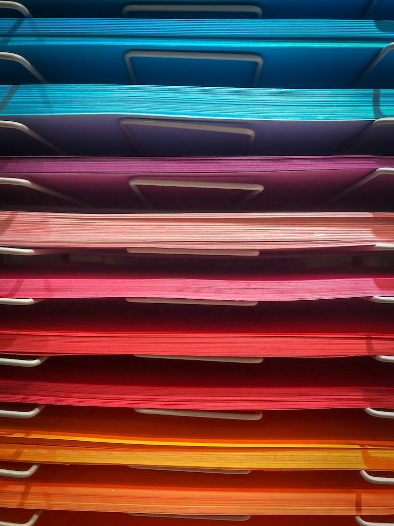 pile of assorted-color papers