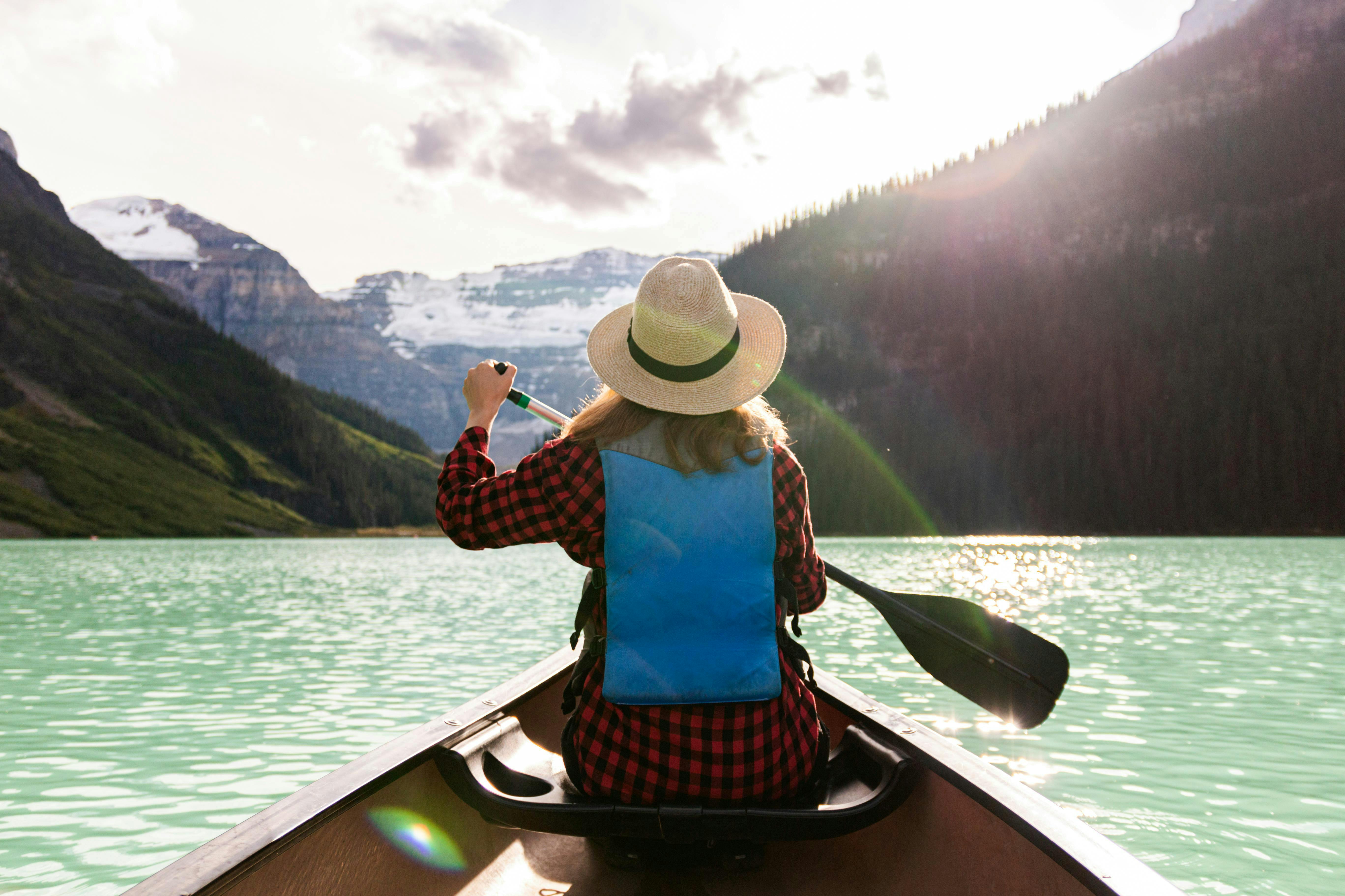 A woman canoeing 