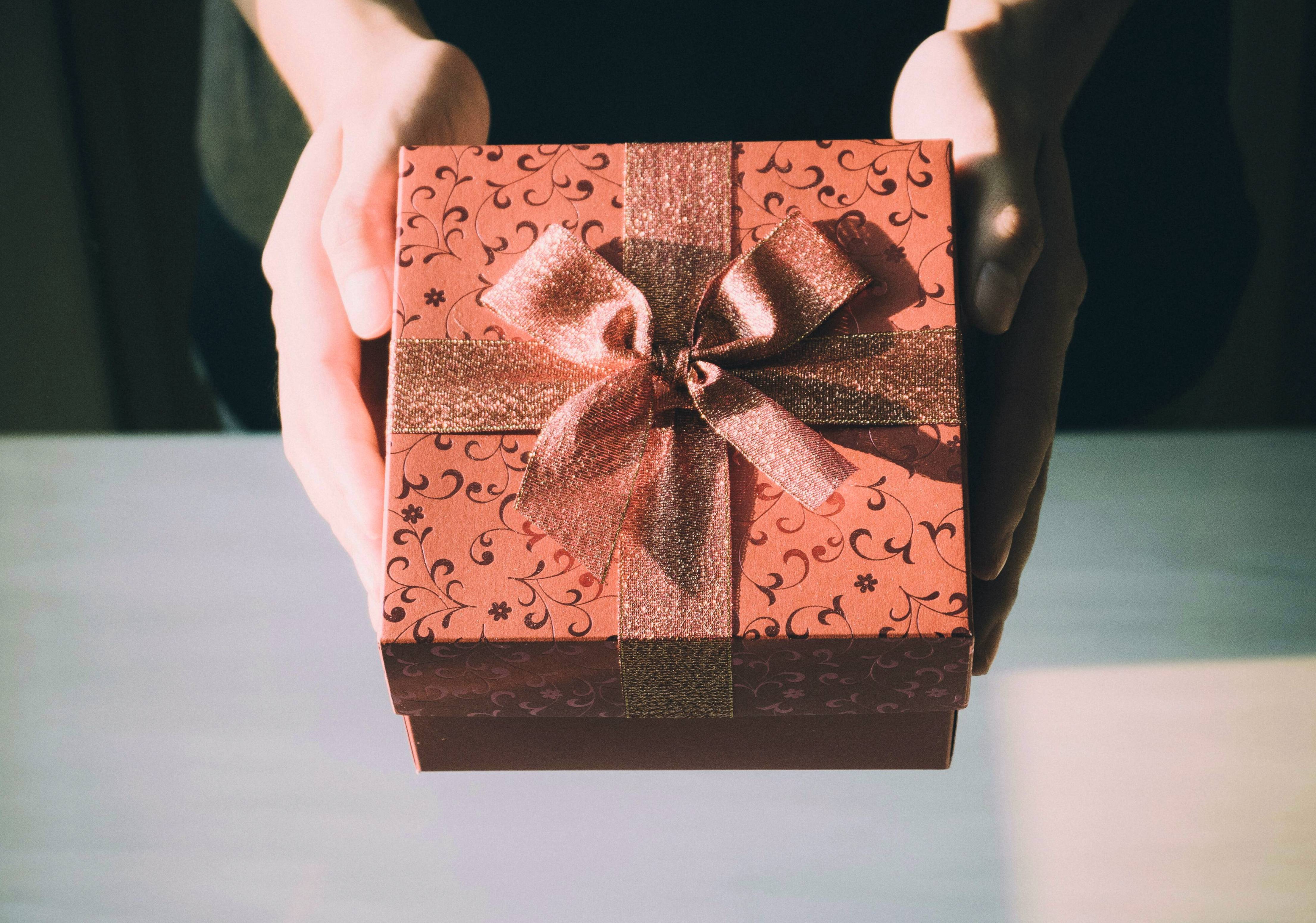 A person holding a gift