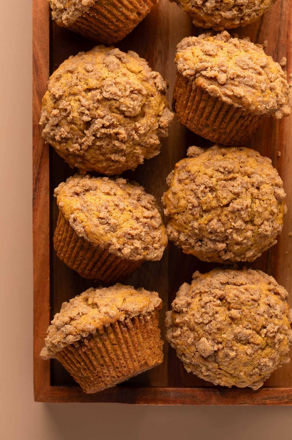 fluffy pumpkin muffins topped with cinnamon sugar streusel