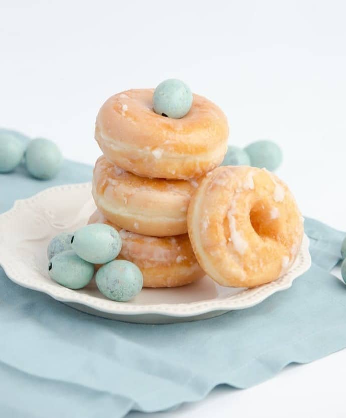 four doughnut on plate