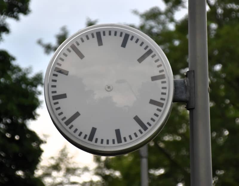 An outdoor clock with no hands.