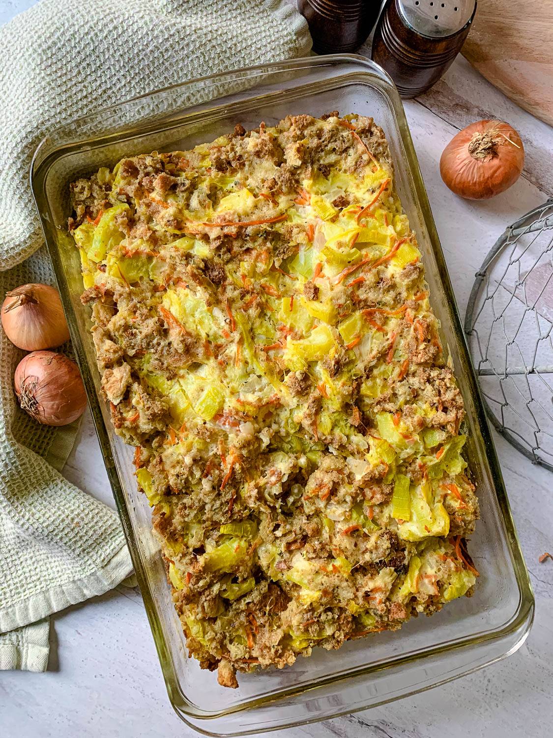 A baking dish of hot and bubbly squash casserole.