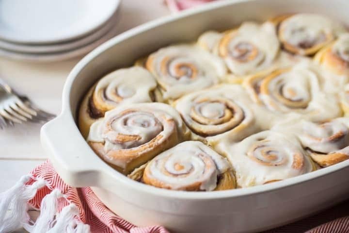 A baking dish filled with cinnamon rolls.