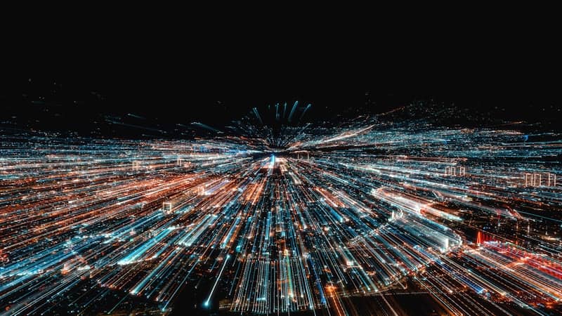 Long exposure light trails of a city at night radiating from a central point