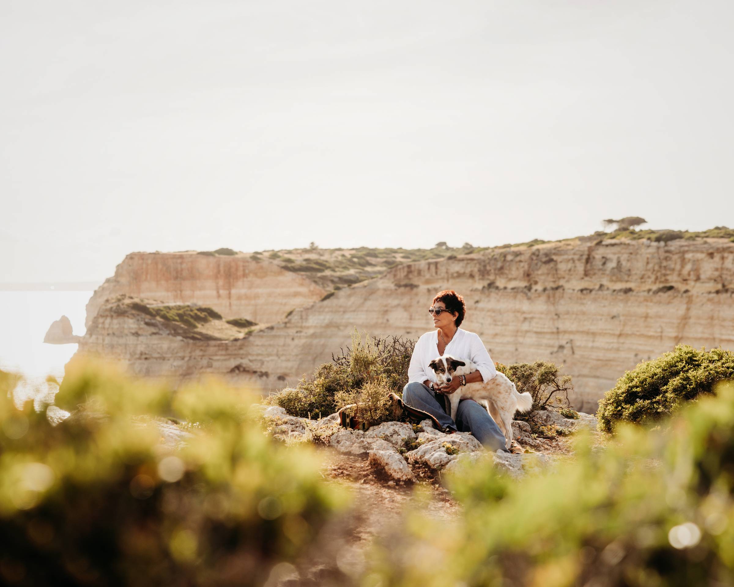 Alicia M. Rodriguez with Sophie on Algarve Cliffs