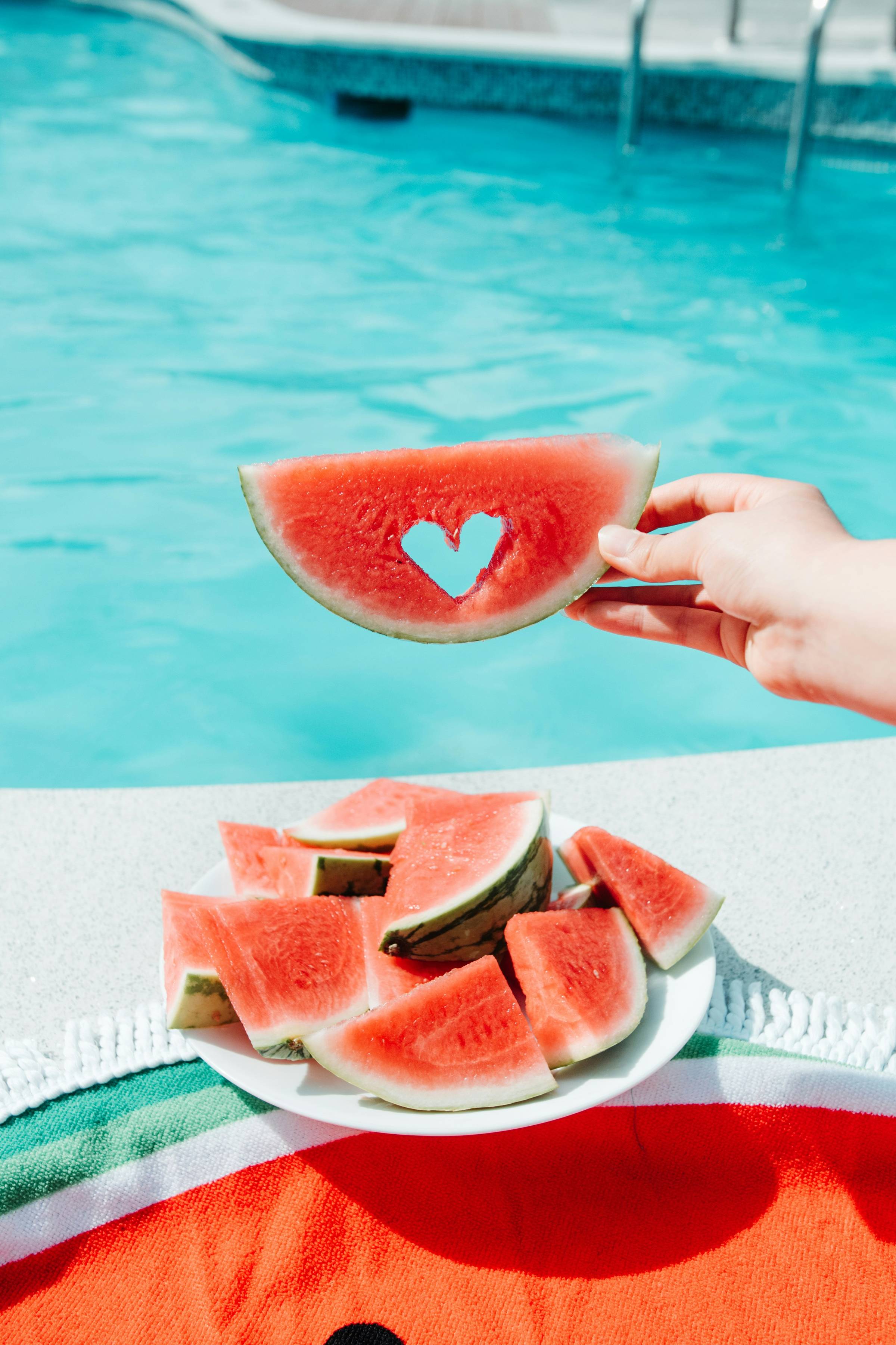 A summer image of watermelon with a heart cut out
