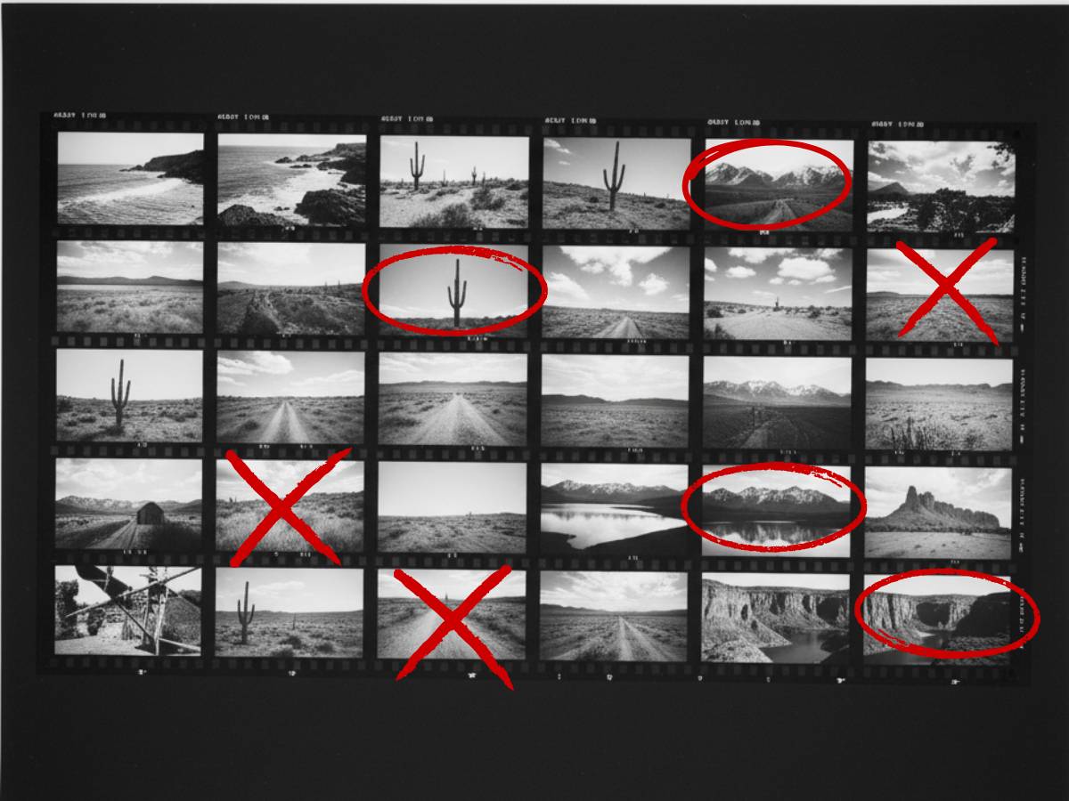 black and white 35mm contact sheet with several images circled in red or crossed out