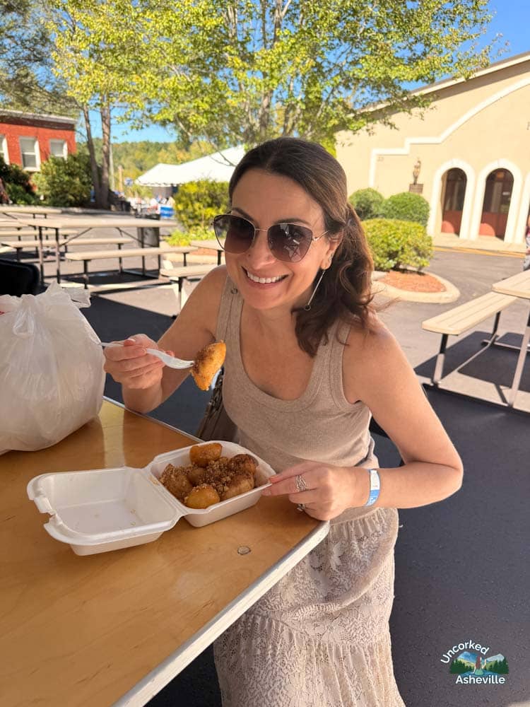Christine eating loukoumades Asheville NC Greek Festival