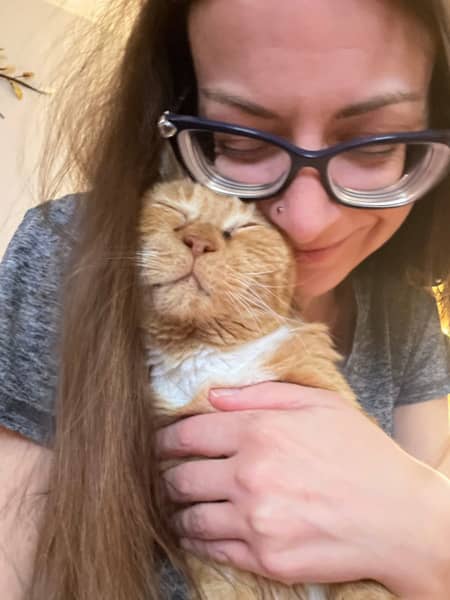 ZoomBa (cat) cuddling