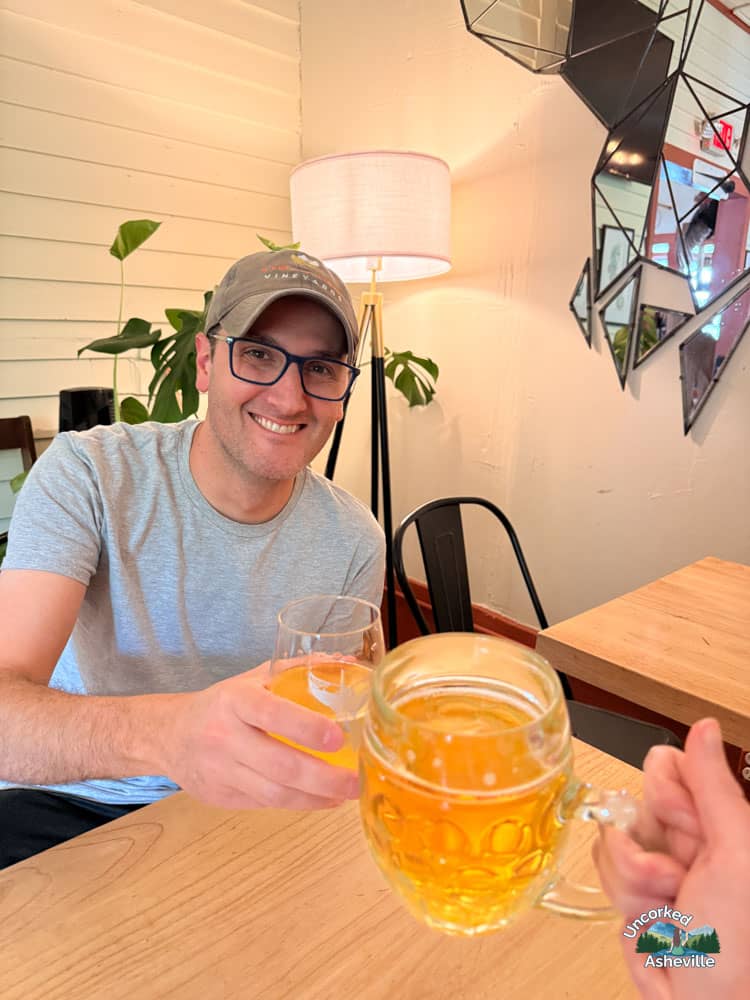 Beer cheers at The Whale Outpost East Asheville NC