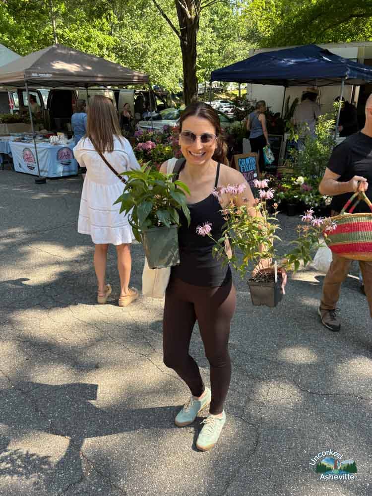 Christine buying plants at North Asheville Tailgate Market