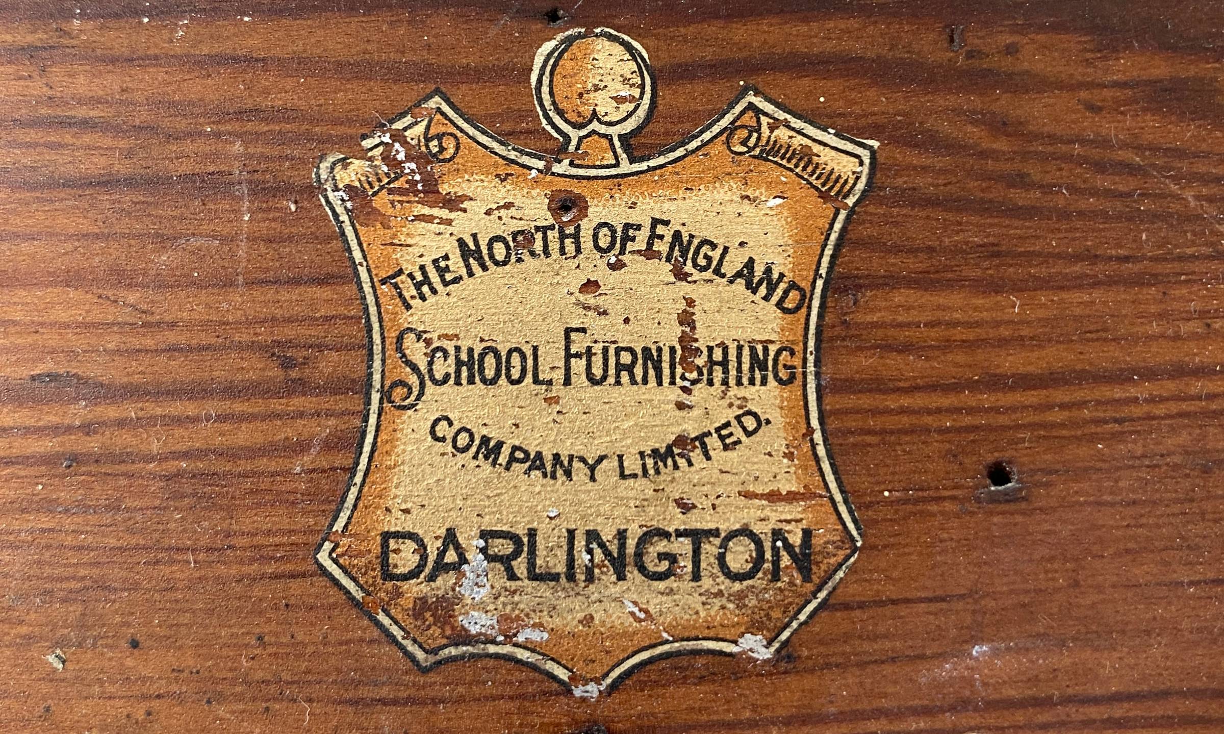 Makers gold label on hardwood background vintage easel