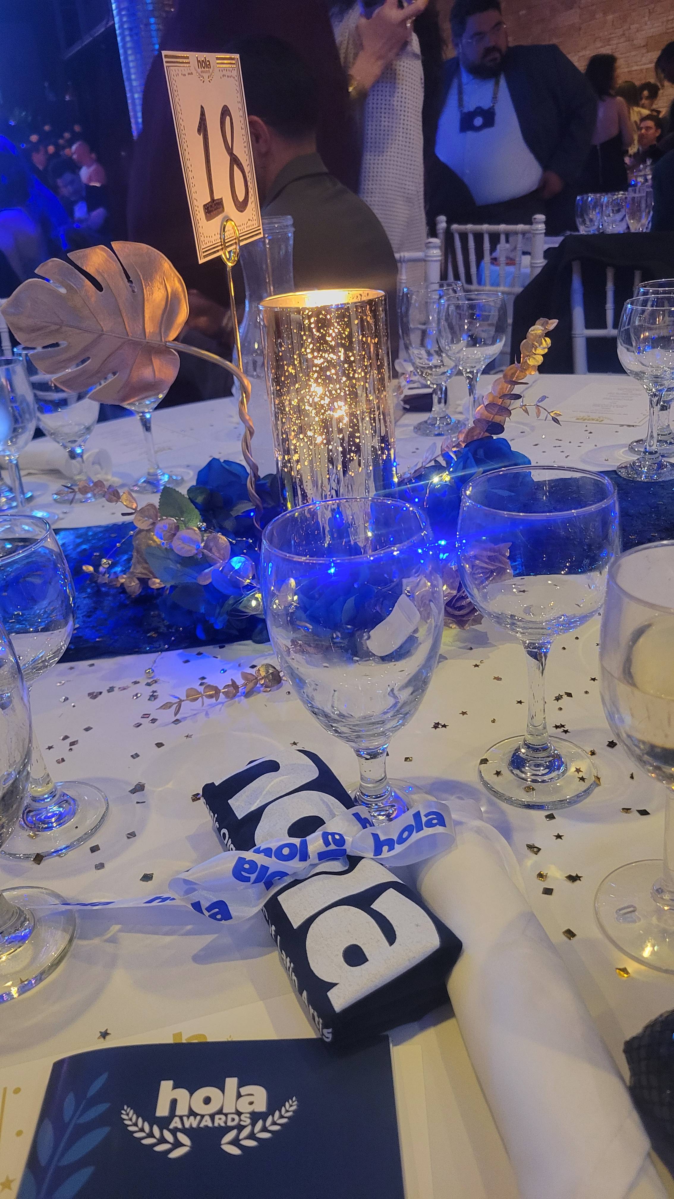 sparkly gala table with wine and water glasses