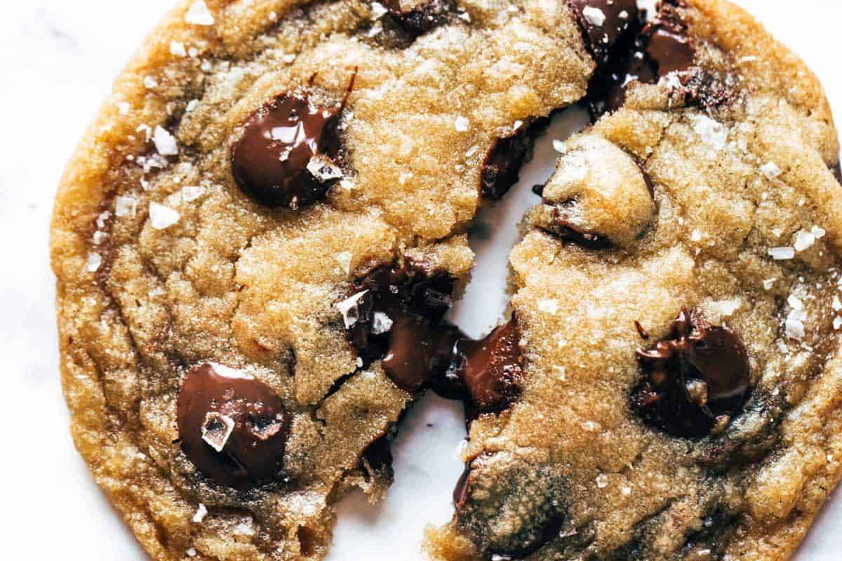 Browned butter chocolate chip cookies broken in two pieces