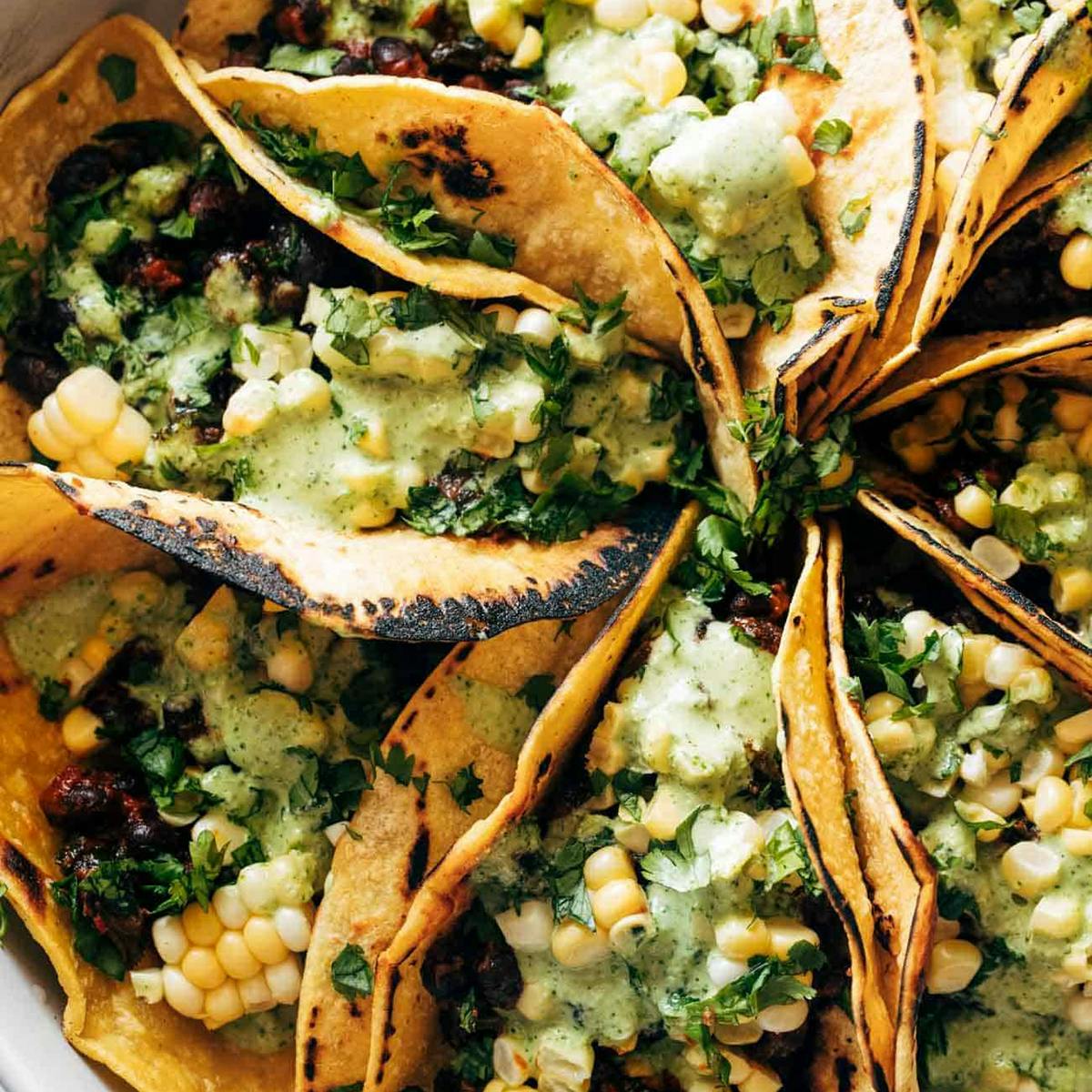 Beans and greens tacos on a platter