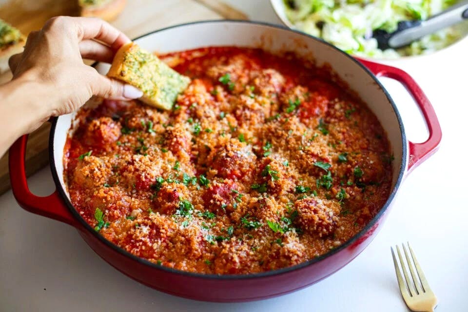 Ginger chicken meatballs in a sandwich.